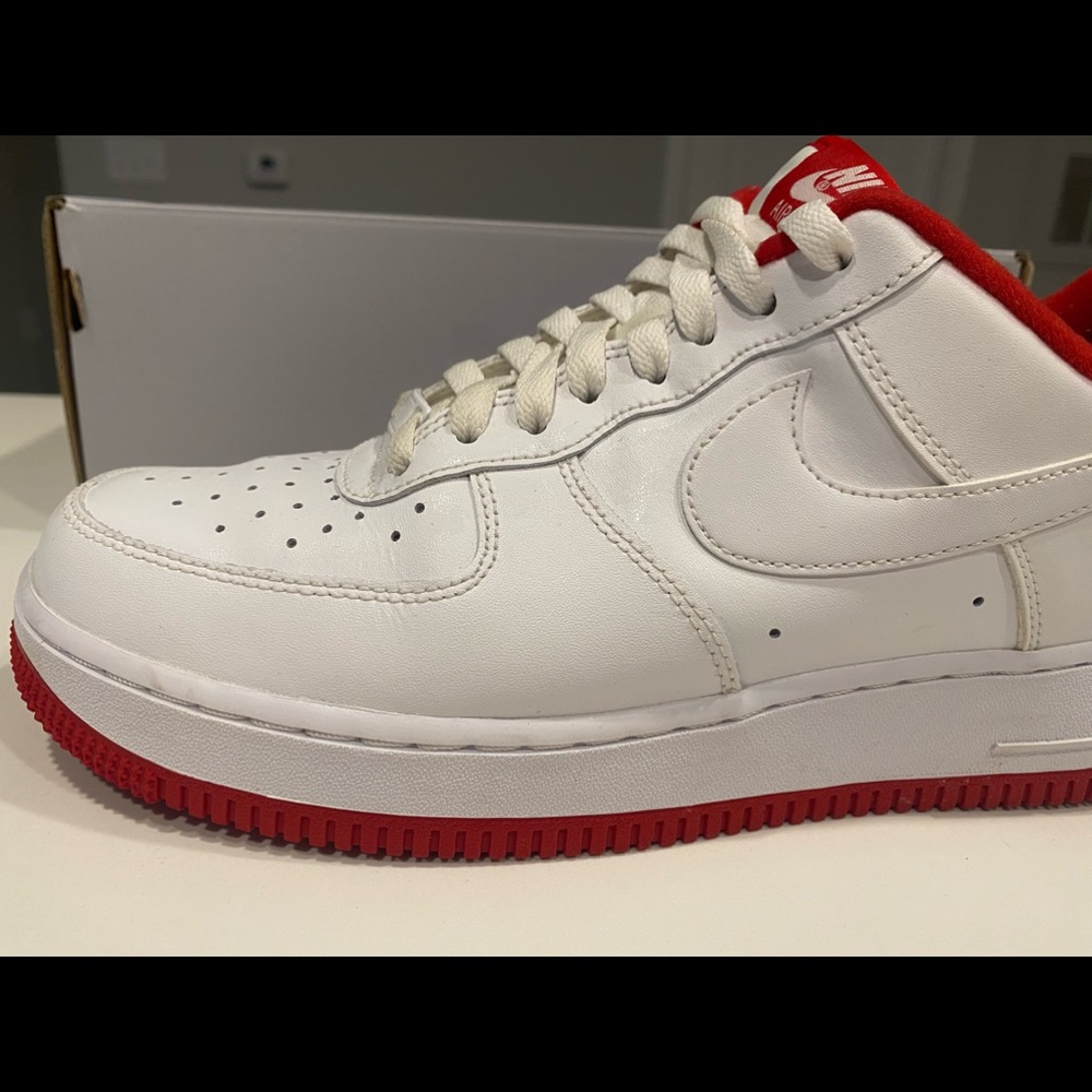 Mens red and white Air Forces 1’s